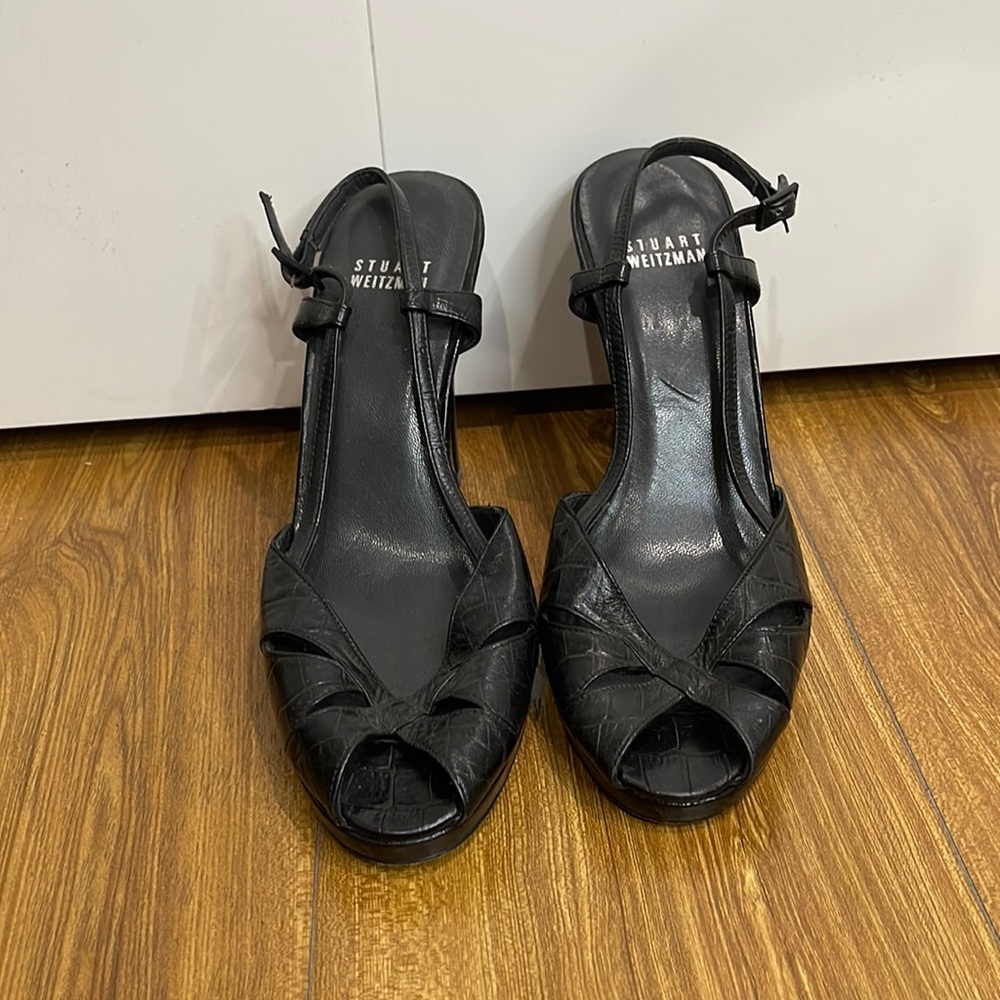 Black strap heels by  Stuart Weitzman